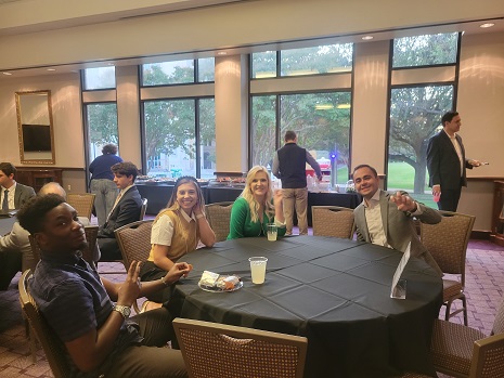 Students ask alumni about the life of an economics major