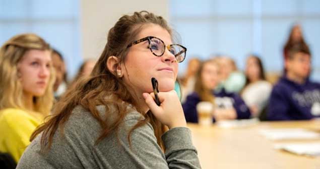 Student listening to lecture
