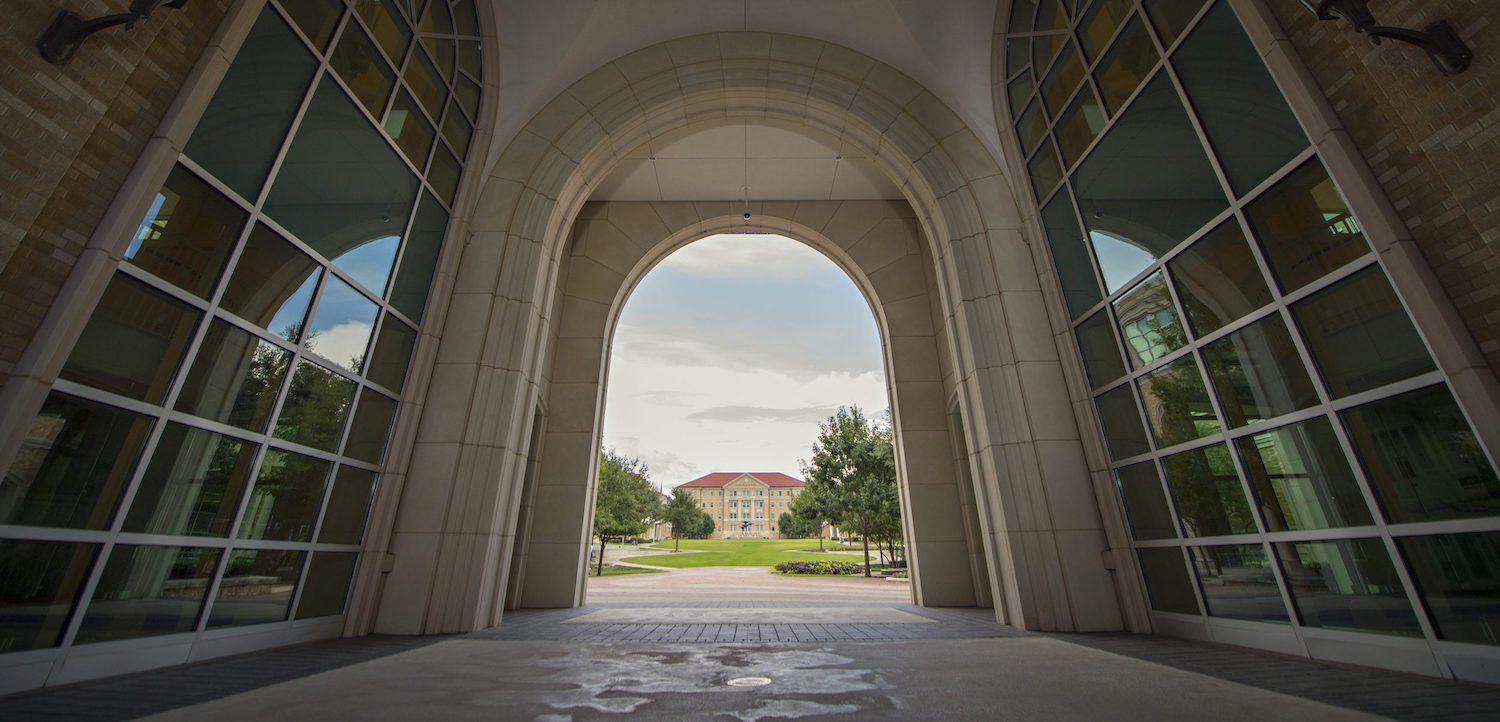 An archway looking into the TCU commons