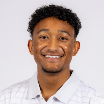 Destin Drummond smiling in a headshot.
